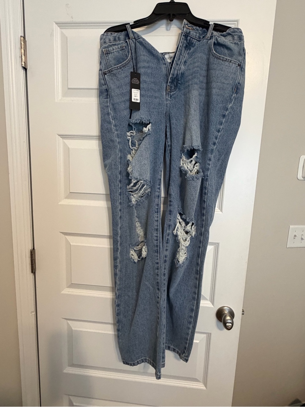 Fashion Nova Light Blue Distressed Flare Jeans
